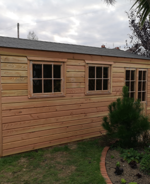 pretty wooden shed in a garden