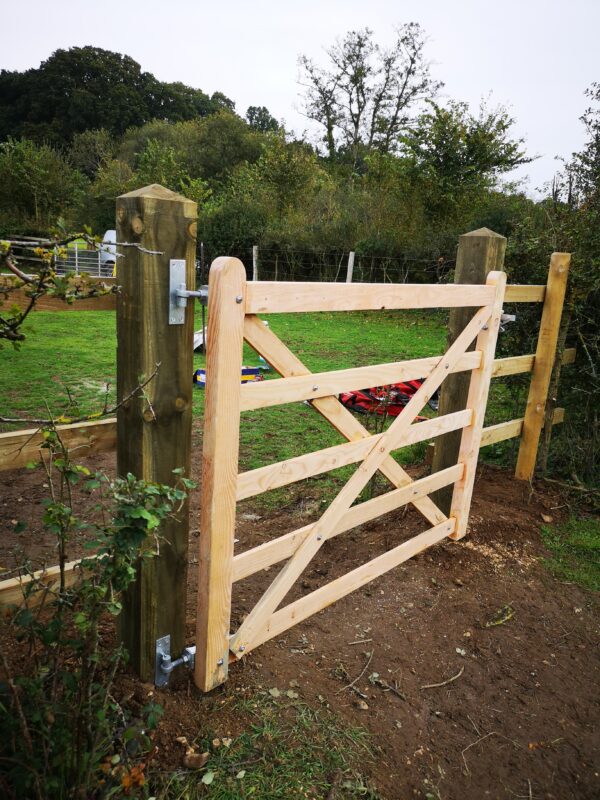 wooden five bar gate to a field