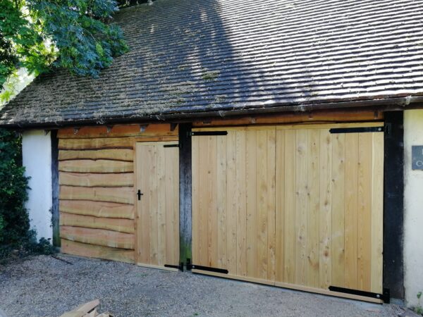 wooden garage doors to a domestic double garage